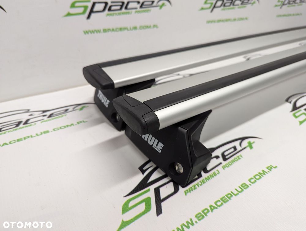 Bagażnik dachowy Thule: belki 960 + Stopy 7106 + kit - 2