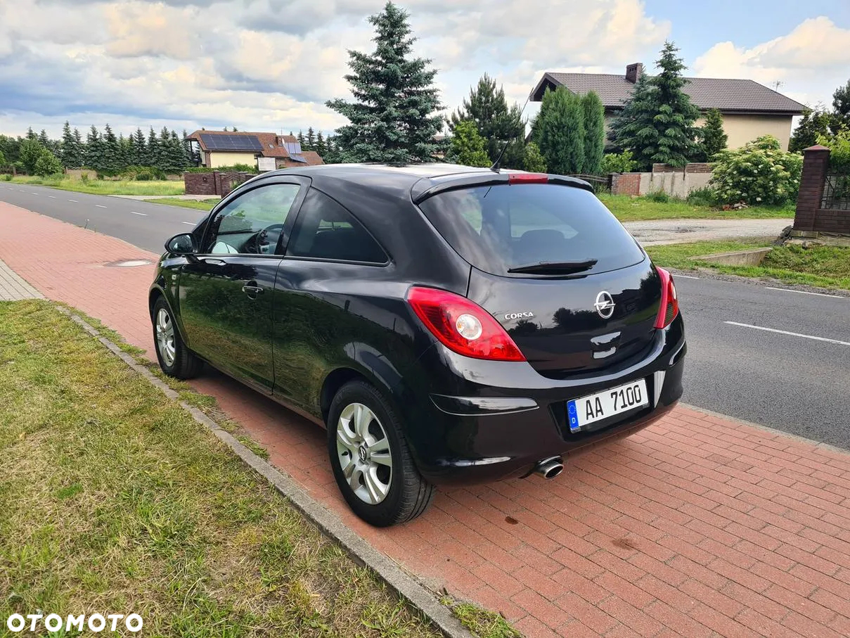 Opel Corsa 1.4 16V Cosmo - 11