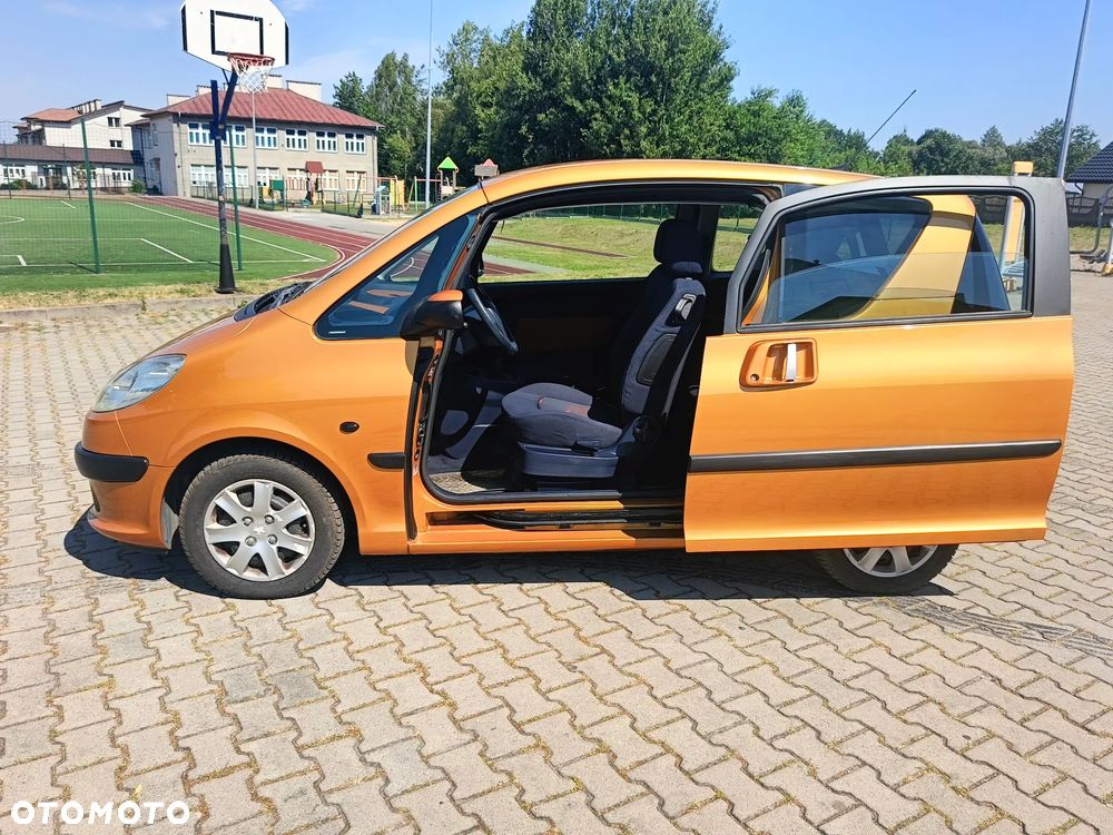 Peugeot 1007 1.4 Trendy - 7