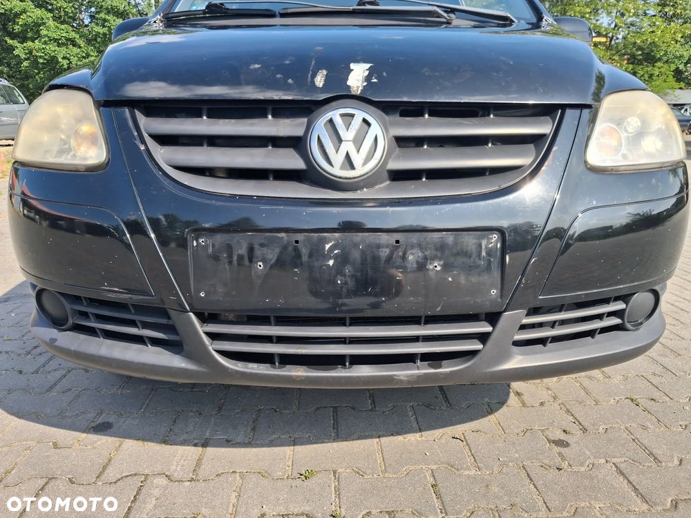 Volkswagen Fox silnik kompletny 1.4 TDI BNM 70KM skrzynia biegów HCS drzwi klapa zderzak błotnik lusterko kolor czarny N2C/BC pompowtrysk turbina dwumasa sprzęgło sterownik moduł przewód rura wiązka maglownica czujnik mcperson zwrotnica piasta zacisk pompa pompka alternator sprężarka klimatyzacji panel szyba boczek fotel kierownica lewarek przepustnica pokrywa osłona nadkole zbiorniczek klema wiązka mechanizm lampa belka sanki zamek schowek zegary manetki NA CZĘŚCI - 10