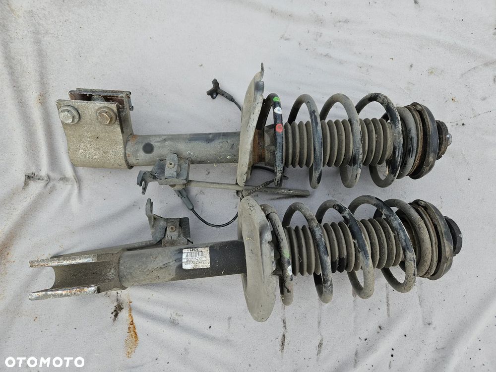 Amortyzator sprezyna McPherson lewy przód Peugeot 3008 I 1,6 THP 2011r 70 tys. km 7043 - 1