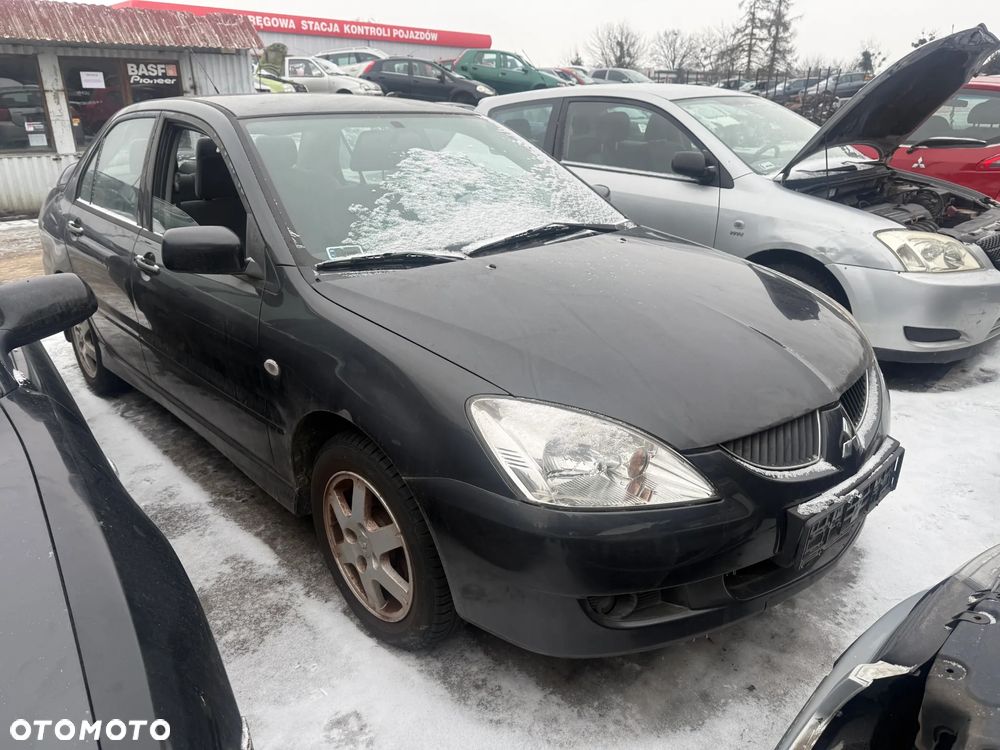 Mitsubishi Lancer VII 1.6 Maska Błotnik Drzwi Zderzak - 1