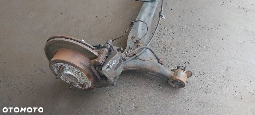 BELKA OŚ ZAWIESZENIA TYŁ TARCZE Z ABS TOYOTA COROLLA VERSO II - 5