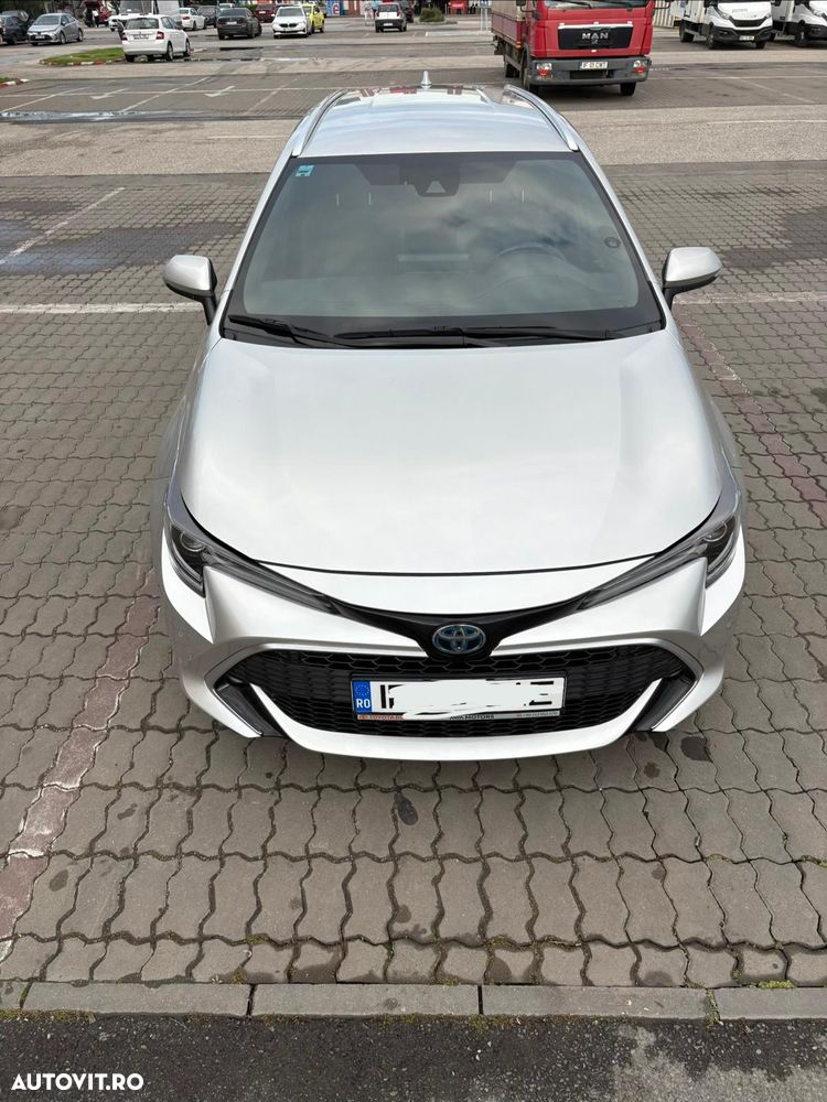 Toyota Corolla 1.8 HSD Exclusive - 18