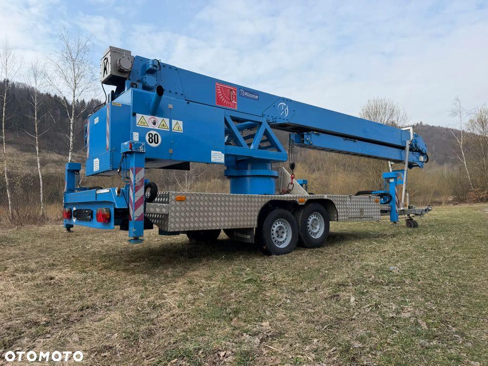 KLAAS K21/31TSR Dźwig Dekarski żuraw zwyżka podnośnik 31m. udźwig 1800kg max. Silnik Yanmar 3cyl. Kosz pojemnik. Dźwig Sterowany całkowicie zdalnie z pilota. Do 3,5 tony Transportowanie samochodem osobowym! Podwieszana oś Hydr. Własny Napęd Hydr. na 2 koła w terenie. Maszyna jak Nowa 2 tyś mtg. 2015r. Po serwisach Dekra. Sprowadzona z Norwegii. Nie różni się od nowej z salonu. Pełna Hydraulika w maszynie. Najbogatsza wersja. OKAZJA  230volt. Zero zużycia! - 1