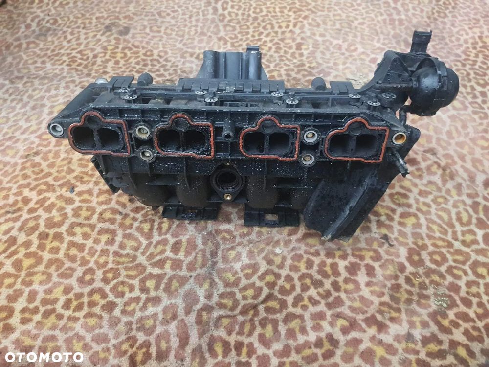 Kolektor Ssący Opel Corsa D 1.2 0280600063 - 2