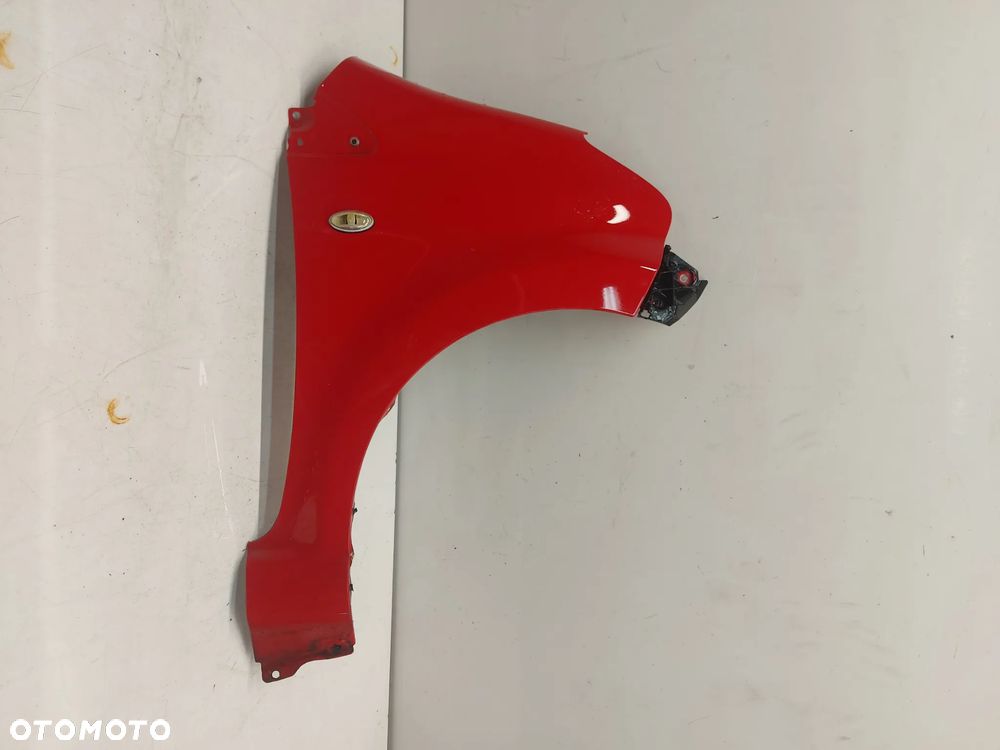 ^ BŁOTNIK PRZÓD PRZEDNI PRAWY TOYOTA AYGO 3P0 CZERWONY - 1