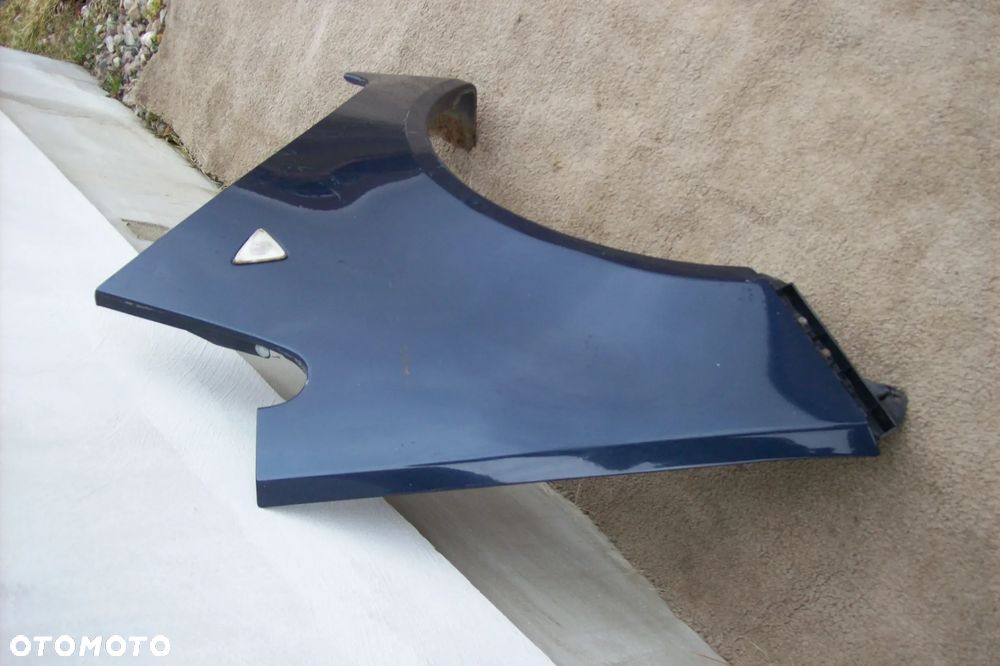 BŁOTNIK PRZEDNI LEWY MITSUBISHI COLT VI ROK 04/08 - 2