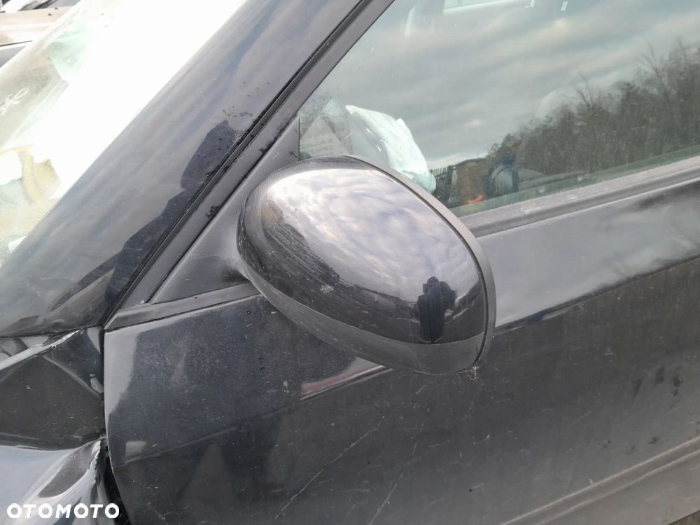 Lusterko zewnętrzne lewe elektryczne SKODA Fabia II 07-14r. 9910 - 2