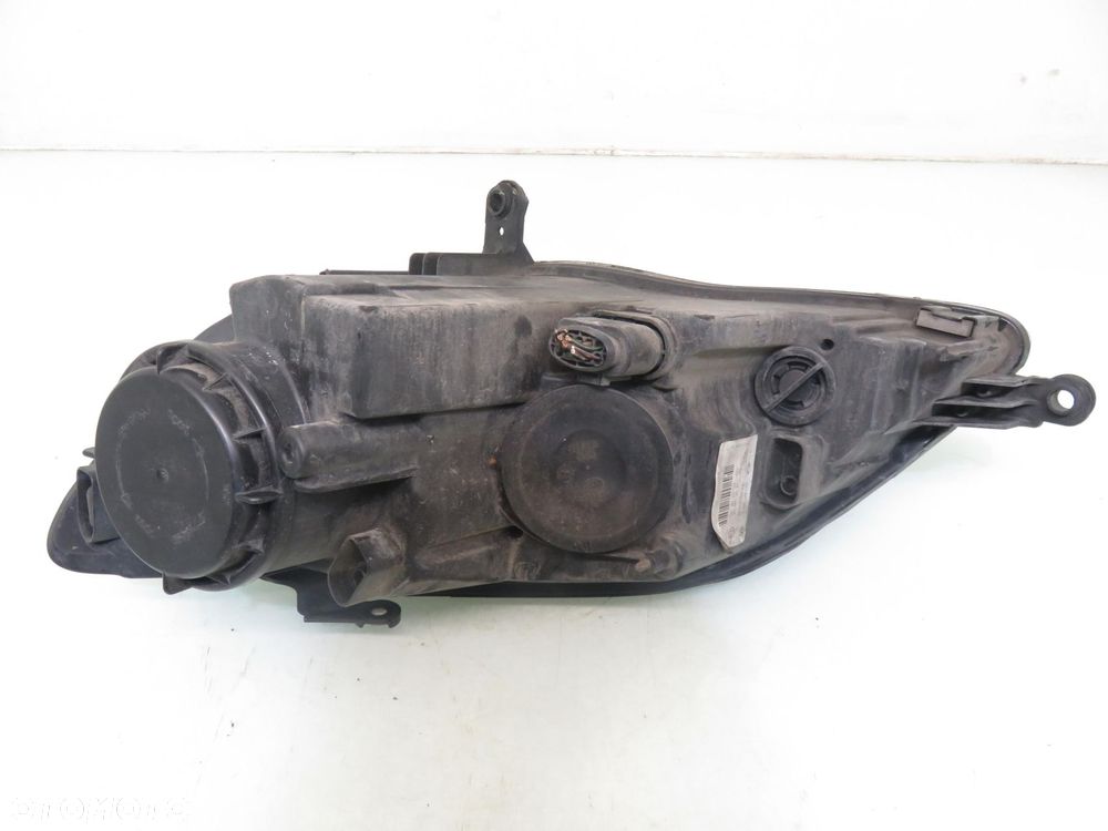 LAMPA PRAWA PRZEDNIA VW GOLF PLUS 5M1941006B 1EE24701302 - 2