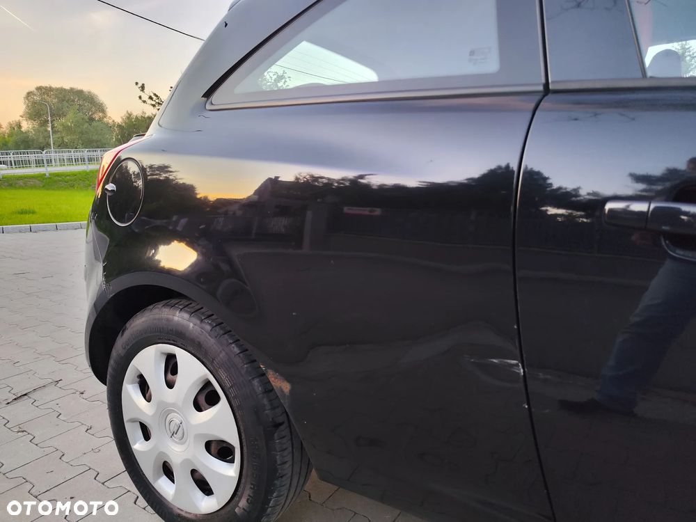 Opel Corsa 1.2 16V Enjoy - 8