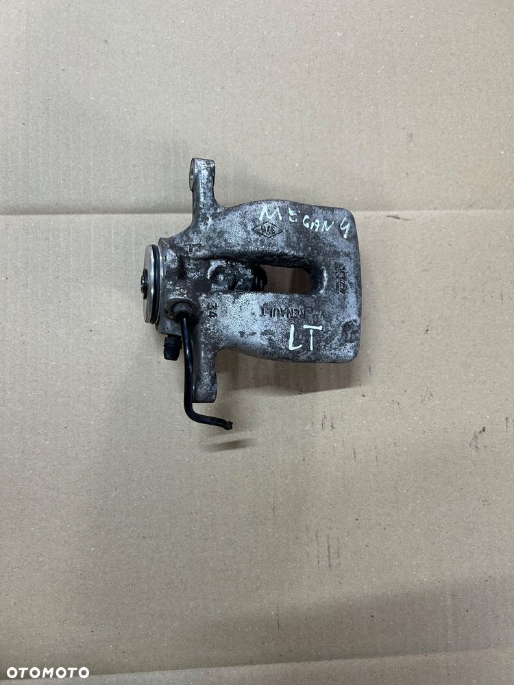 Renault Megane IV zacisk lewy tył elektryczny tylny - 1