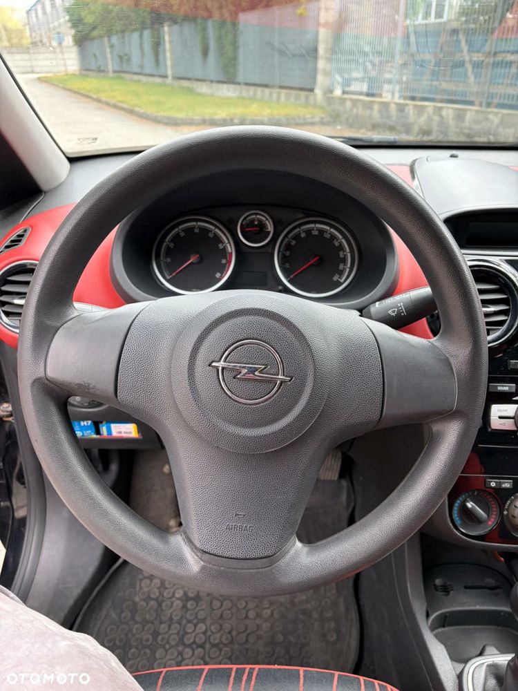 Opel Corsa 1.4 16V Cosmo - 11