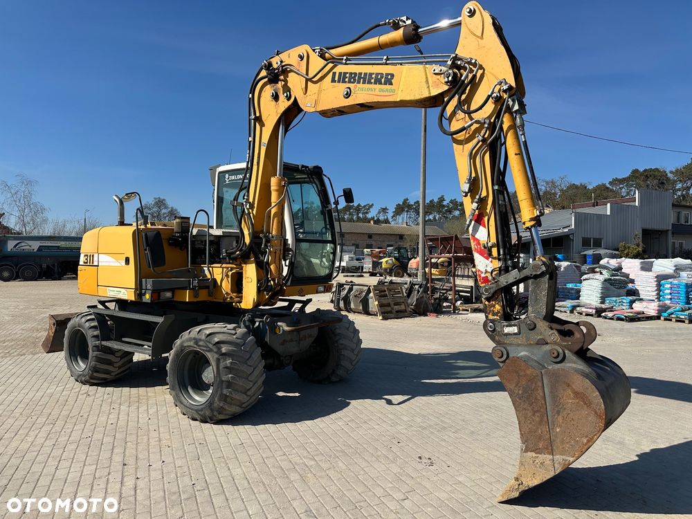 Liebherr A 311 Litronic - 3