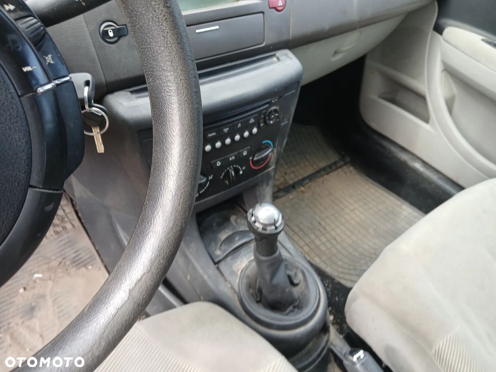 citroen C4 5D fotel fotele kanapa deska kokpit podsufitka boczek boczki klamka podłokietnik licznik - 4