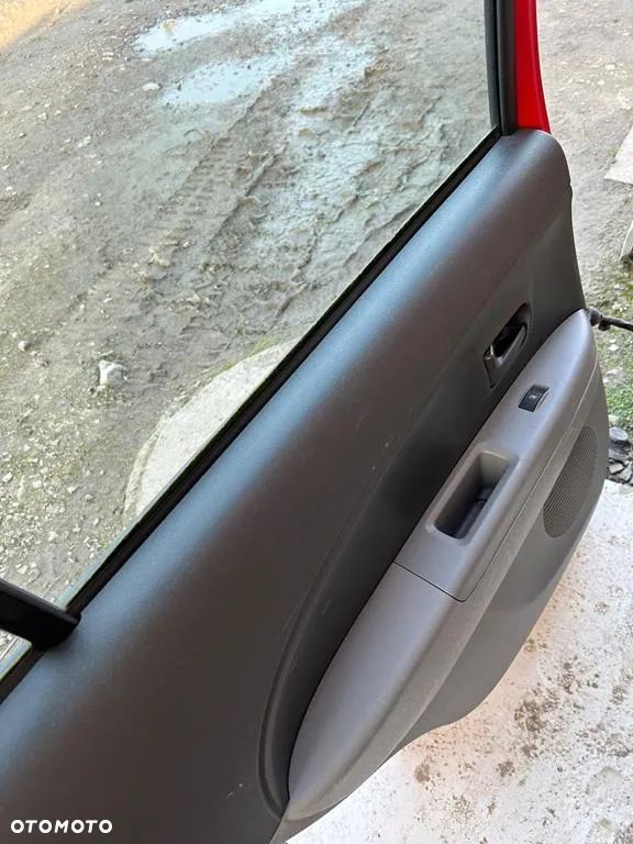 Drzwi lewe tył tylna Daihatsu Sirion II Justy IV bez malowania - 8