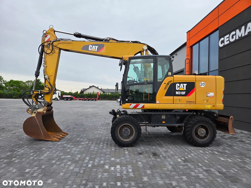 Caterpillar M318F / z Niemiec / - 2