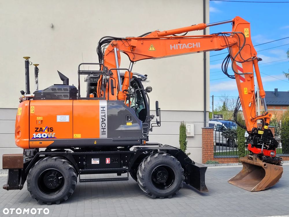 Hitachi ZX 140W / ROTOTILT ze szczypcami / system GPS 3D LEICA / - 1