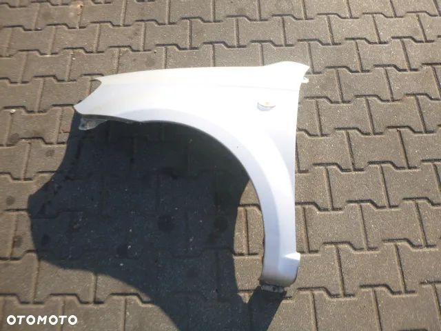 BŁOTNIK LEWY PRZÓD LEWY PRZEDNI CHEVROLET AVEO II T250 07-11