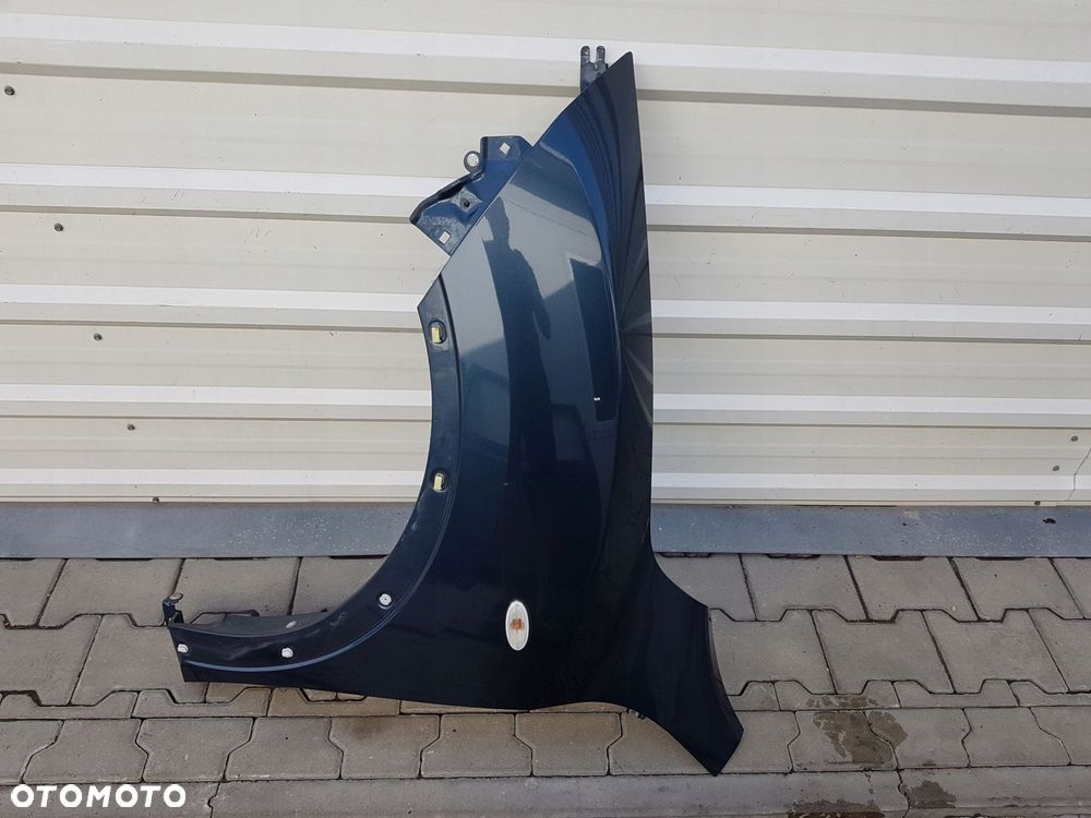 NISSAN JUKE 10-14r BŁOTNIK LEWY PRZÓD RAQG - 1