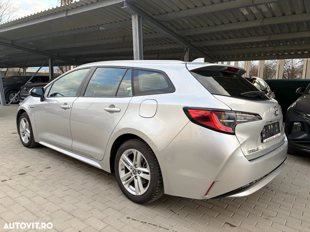 Toyota Corolla 1.8 HSD Business - 19