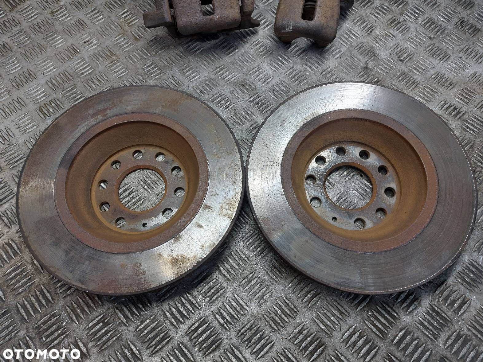 TARCZE HAMULCOWE TYŁ + KLOCKI + ZACISKI AUDI A6 C6 - 4