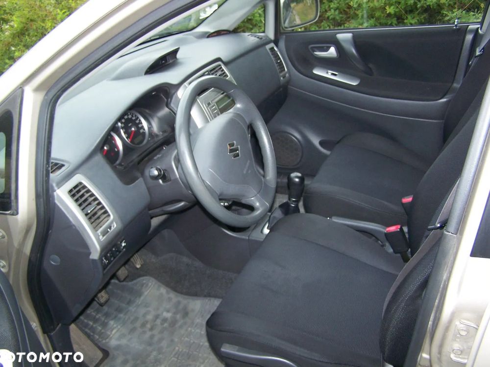 Suzuki Liana 1.6 - 9