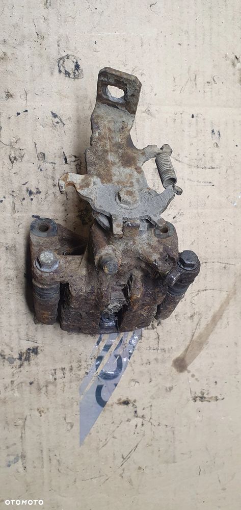 Zacisk hamulcowy lewy tył tylny lewy Nissan Almera Tino - 1