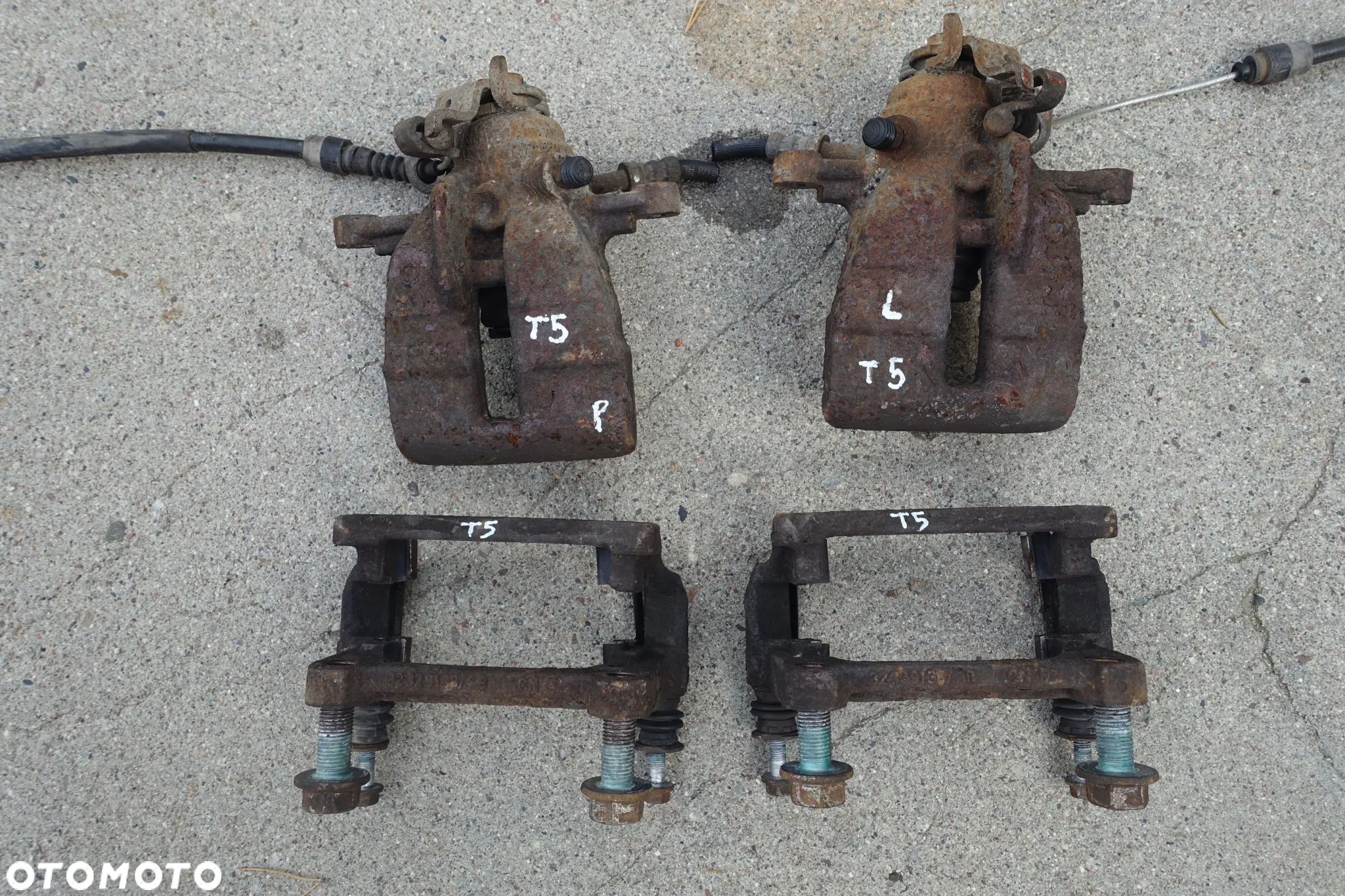 ZACISK HAMULCOWY JARZMO LEWY PRAWY TYŁ VW T5 - 1