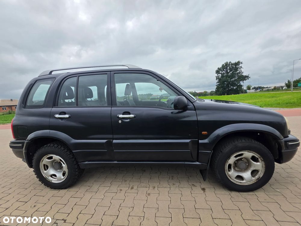 Suzuki Grand Vitara 2.0 - 7