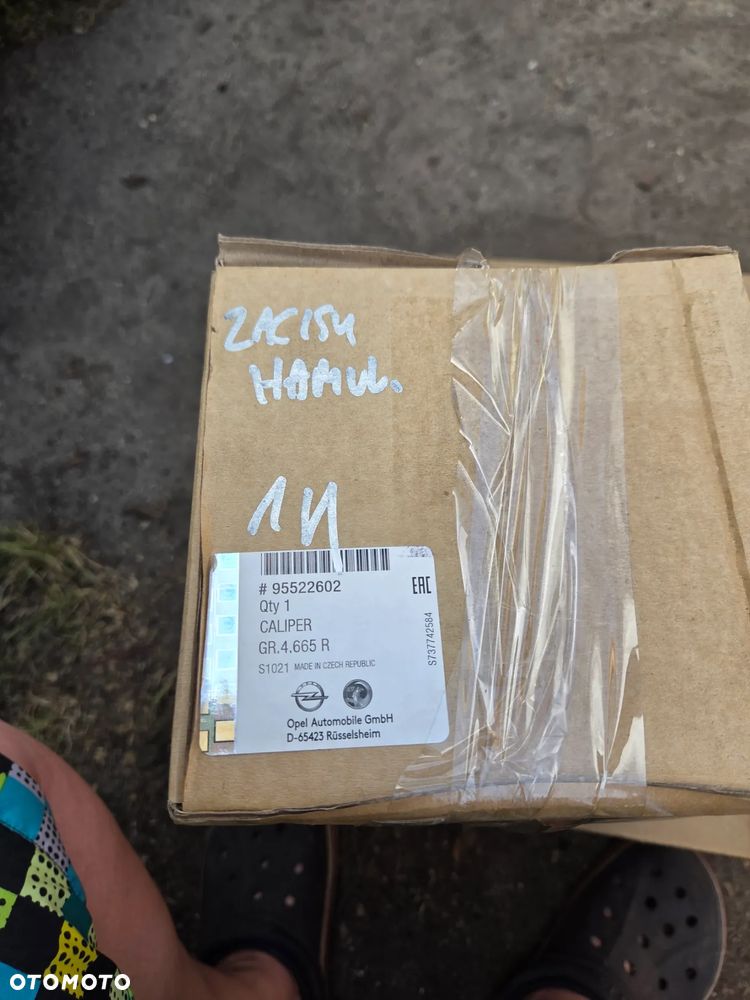 Zacisk hamulcowy lewy przód przedni Opel Astra J Mokka X Zafira C 95522602 1693226880 - 7