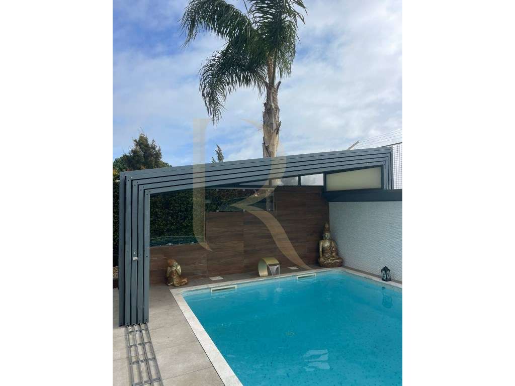 Moradia T4 com piscina e garagem na Charneca da Caparica - Grande imagem: 4/22