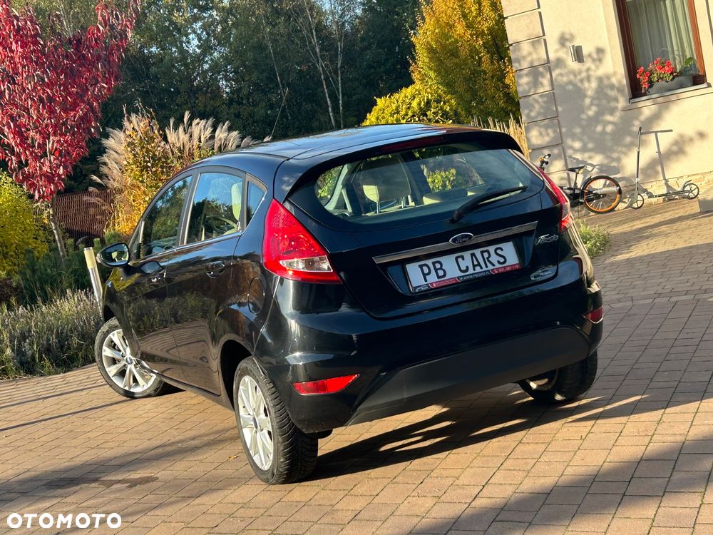Ford Fiesta 1.25 Ghia - 16