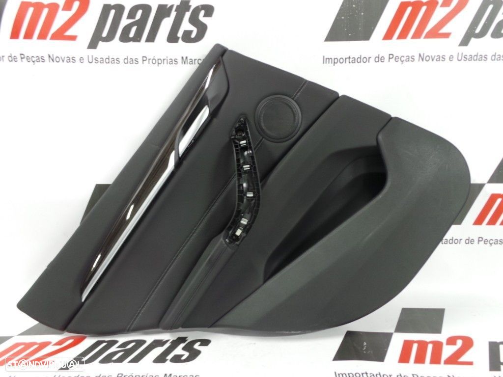 Forra da porta Esquerdo/Trás Seminovo/ Original BMW X1 51427438115 - 1