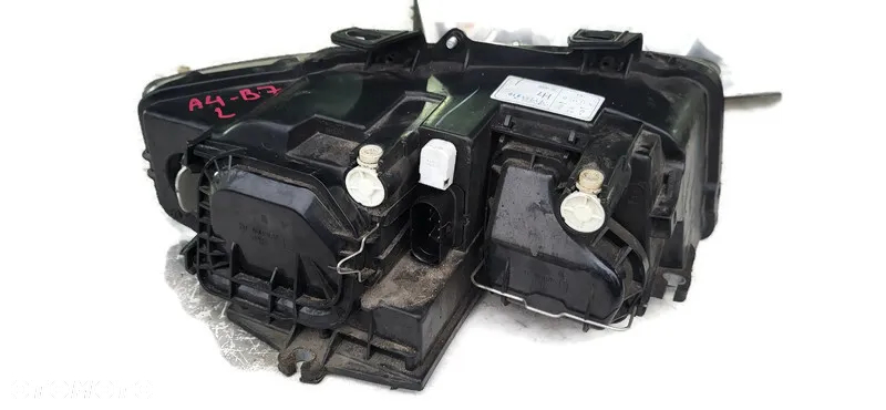AUDI A4 B6 02r LAMPA LEWA PRZEDNIA PRZÓD 8E0941030C - 2