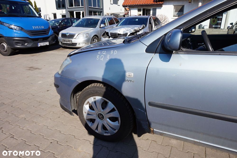 MASKA ZDERZAK BŁOTNIKI LAMPY COROLLA E12 8Q3  TOYOTA 2001-2004 SREBRNY PRZÓD KOMPLETNY - 10