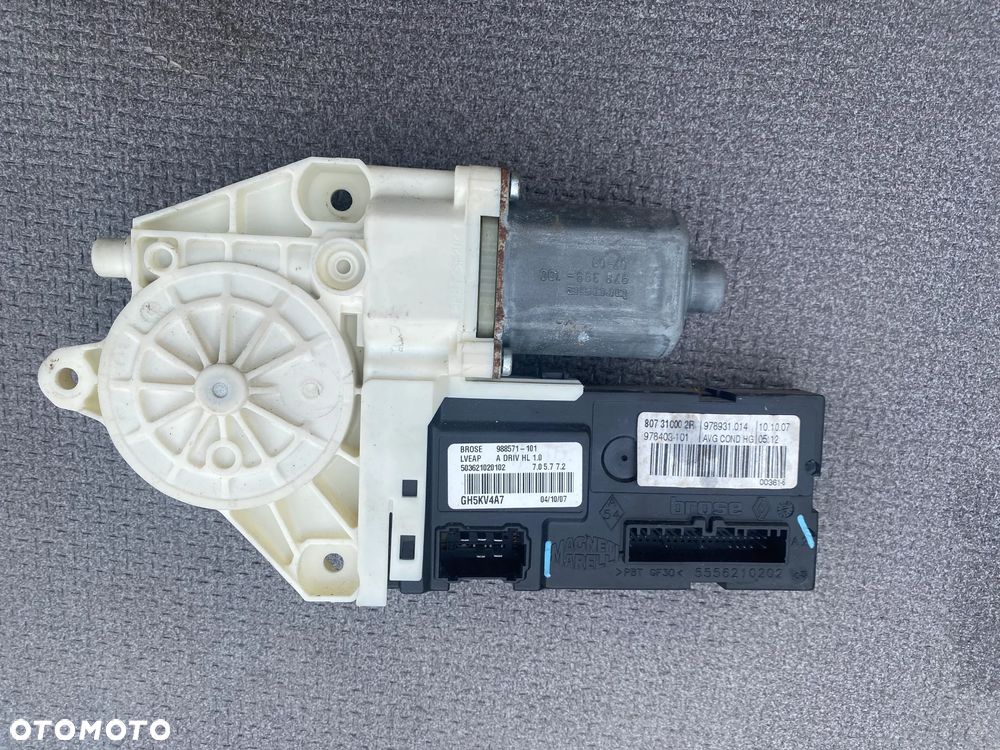 SILNICZEK SZYBY LEWY PRZÓD RENAULT LAGUNA III KOMBI 988571101 5556210202 - 2
