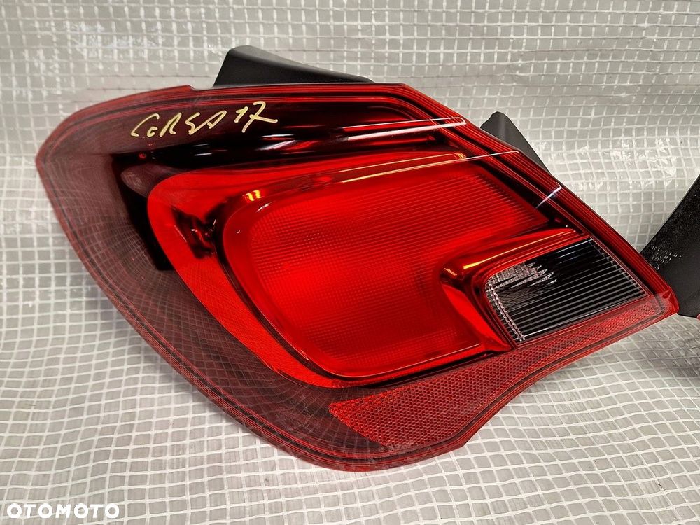 lampa tyl tylna lewa opel corsa e 5d 2014- 2019 39068622 europa demontaz - 2
