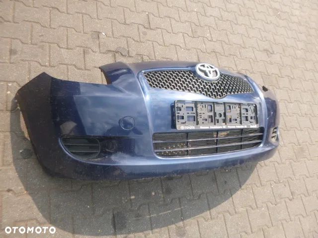 ZDERZAK PRZÓD PRZEDNI TOYOTA YARIS II 05-09 KOLOR 8P4 - 9