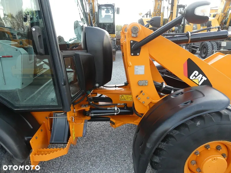 Caterpillar CAT 906H / Z Niemiec / 6424mtg / - 19
