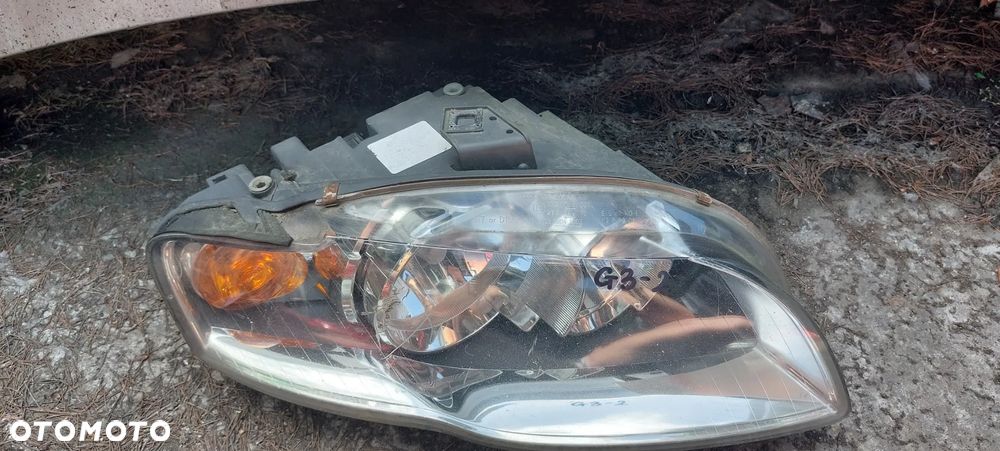 .  PRZOD PRZEDNIA LAMPA LEWA AUDI A4 B7 - 2
