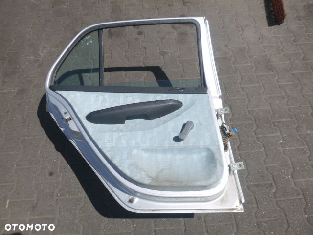 DRZWI LEWY TYŁ LEWE TYLNE SKODA FABIA I HB KOMPLETNE KOLOR 9102 - 11