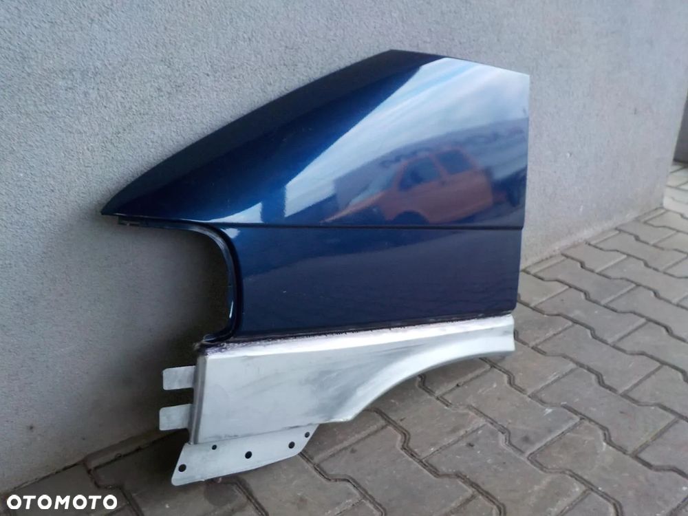 VW T4 CARAVELLE LIFT BŁOTNIK LEWY PRZÓD - 2