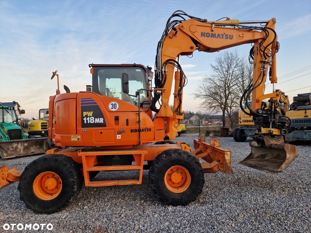 Komatsu PW118 - 1