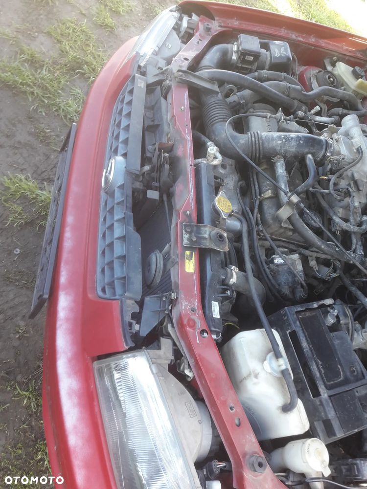 Mazda Demio 97-Klapa Zderzak tylny szybapas  lampa belka Kolor SU - 7