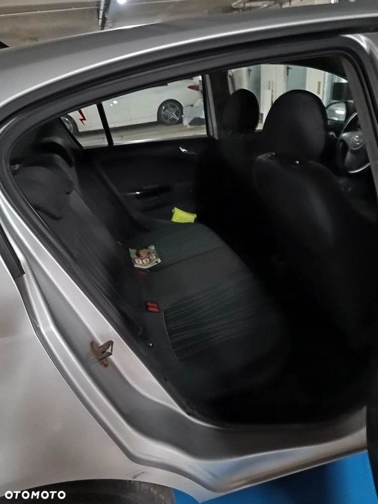 Opel Corsa 1.2 16V Enjoy - 4