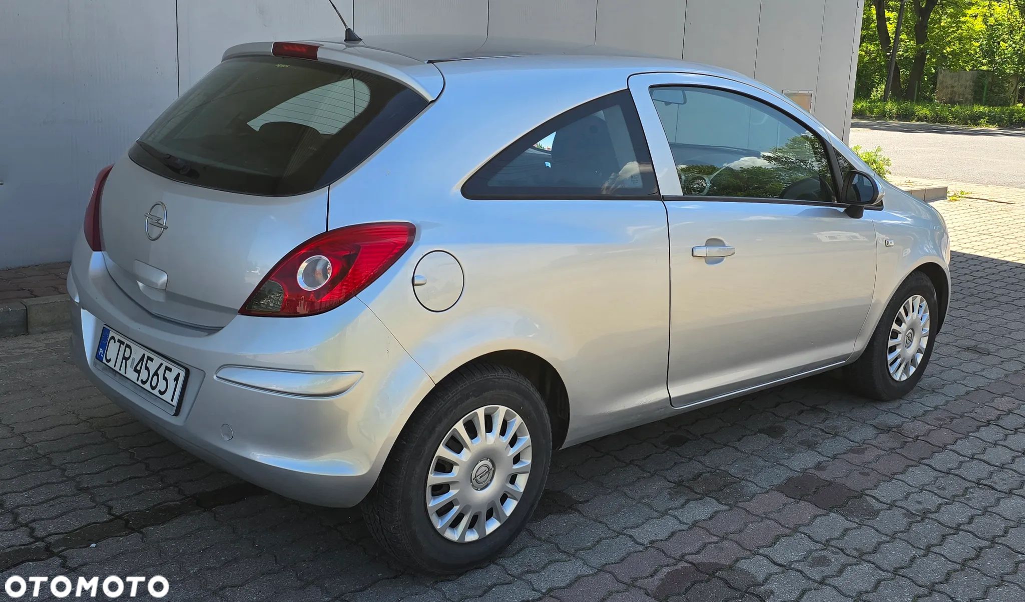 Opel Corsa 1.2 16V Cosmo - 1