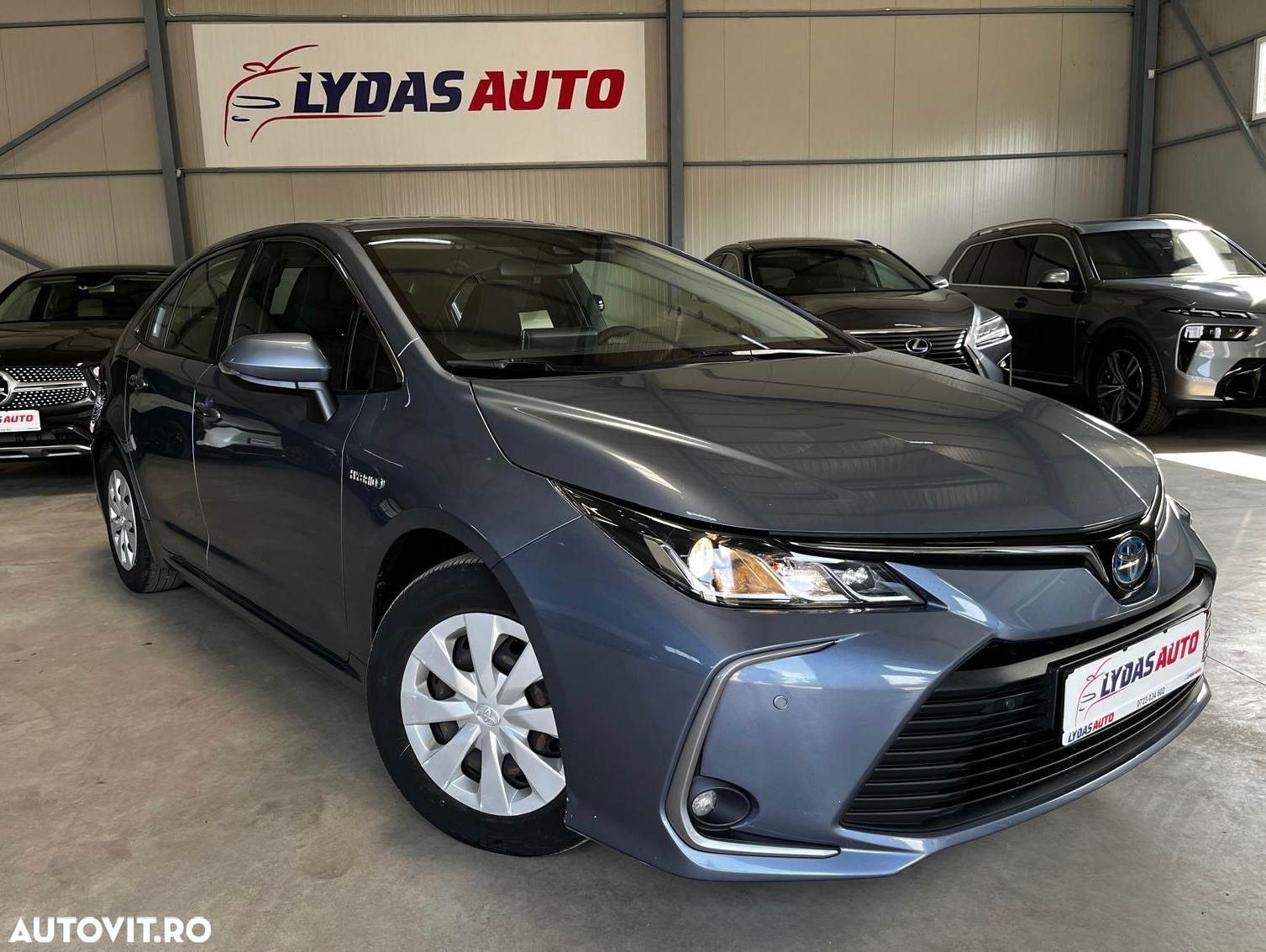 Toyota Corolla 1.8 HSD Business - 6