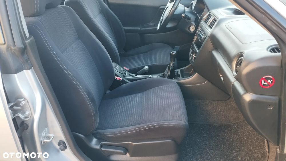 Subaru Impreza 1.6 TS - 17