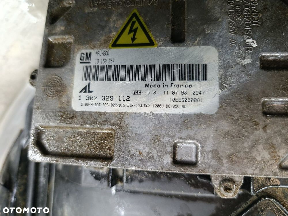 LAMPA PRZÓD PRAWA XENON OPEL ZAFIRA B 13252471 13153357 0301214282  AL  GM - 1